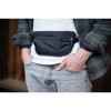 Vyölaukku cocoon TRAVEL WAIST WALLET Phantom Black